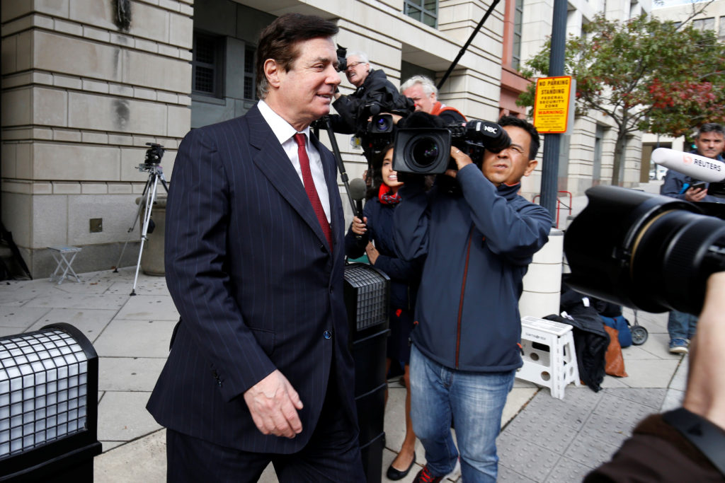 Paul Manafort, former campaign manager for U.S. President Donald Trump, departs after a bond hearing at U.S. District Cour...