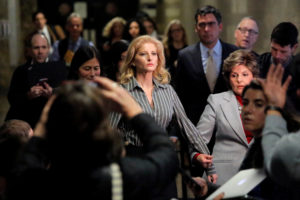 Summer Zervos, a former contestant on The Apprentice, leaves New York State Supreme Court with attorney Gloria Allred (R) after a hearing on the defamation case against U.S. President Donald Trump in Manhattan, New York City, U.S., December 5, 2017. REUTERS/Andrew Kelly - RC1D0346BE00