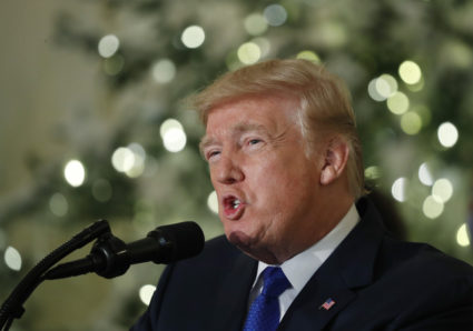 U.S. President Donald Trump delivers a speech on tax reform legislation at the White House in Washington, U.S., December 13, 2017. REUTERS/Kevin Lamarque - HP1EDCD1MKU0Y
