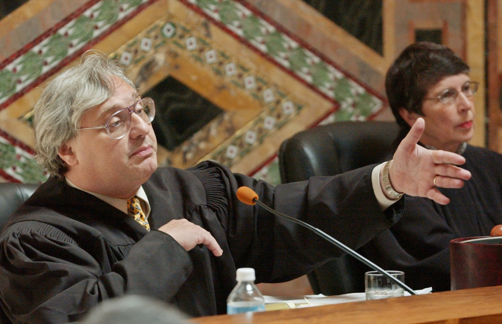 FILE PHOTO: Judge Alex Kozinski, of the 9th U.S. Circuit Court of Appeals, gestures during oral arguments in San Francisco...