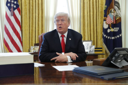 File photo of President Donald Trump in the Oval Office of the White House by Jonathan Ernst/Reuters