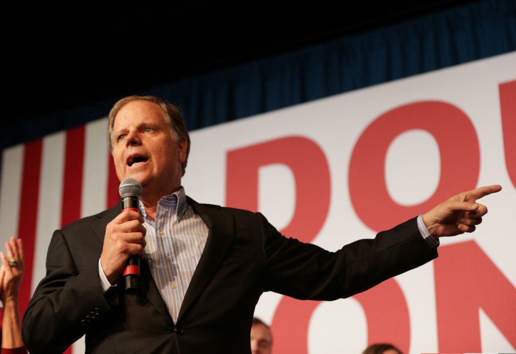 Democratic Alabama U.S. Senate candidate Doug Jones speaks to his supporters during a rally at Old Car Heaven in Birmingha...