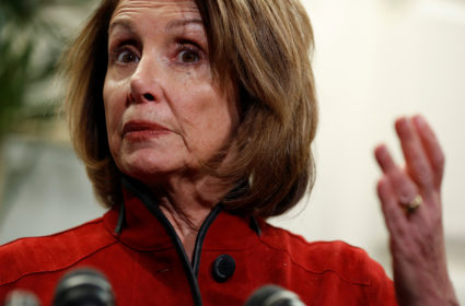 House Minority Leader Nancy Pelosi (D-CA) gestures before the House-Senate Conferees hold an open conference meeting on the "Tax Cuts and Jobs Act" on Capitol Hill in Washington, U.S., December 13, 2017. REUTERS/Joshua Roberts - RC1E05C93FA0