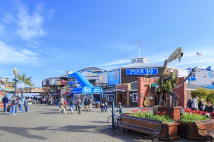 North America, United States, California, San Francisco, People walking in market nearby shops. (Photo by: JTB Photo/UIG via Getty Images)