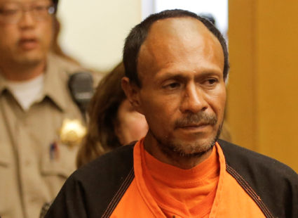 FILE PHOTO: Jose Ines Garcia Zarate, arrested in connection with the July 1, 2015, shooting of Kate Steinle on a pier in San Francisco is led into the Hall of Justice for his arraignment in San Francisco, California, U.S. on July 7, 2015. REUTERS/Michael Macor/Pool/File Photo - RC16BA9C3EC0