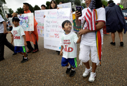 Boys wearing shirts calling for their parents not to be deported march during a rally by immigration activists CASA and United We Dream demanding the Trump administration protect the Deferred Action for Childhood Arrivals (DACA) program and the Temporary Protection Status (TPS) programs, in Washington, D.C. Photo by Joshua Roberts/Reuters