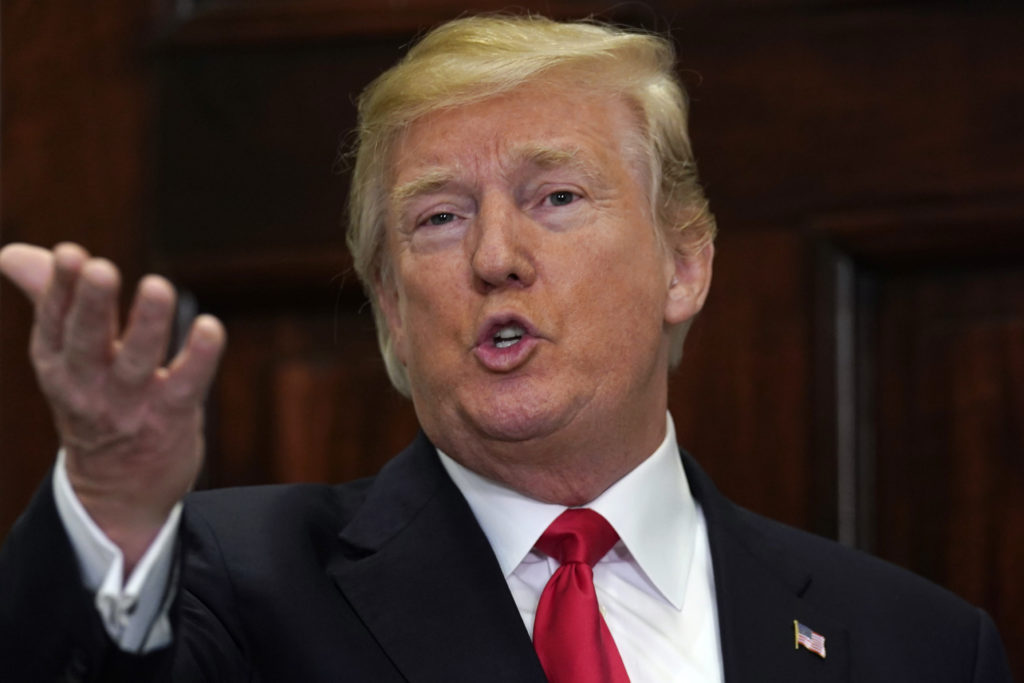 U.S. President Donald Trump delivers remarks after participating in the swearing-in ceremony for the Secretary of the Depa...