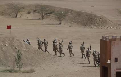 Pakistan Rangers walk with their weapons during a 2015 counter-terrorism training demonstration at the Rangers Shooting & Saddle Club (RSSC) on the outskirts of Karachi, Pakistan. Photo by Akhtar Soomro/Reuters