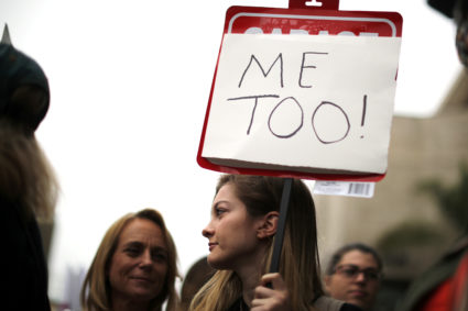 FILE PHOTO: People participate in a "MeToo" protest march for survivors of sexual assault and their supporters in Hollywood, Los Angeles, California, U.S. on November 12, 2017. REUTERS/Lucy Nicholson/File Photo - RC1C889713F0