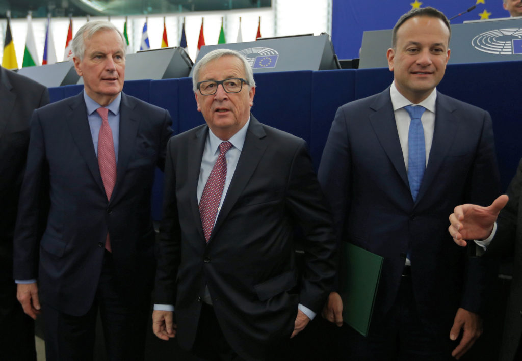 European Union's chief Brexit negotiator Michel Barnier (L), European Commission President Jean-Claude Juncker (C) and Ire...