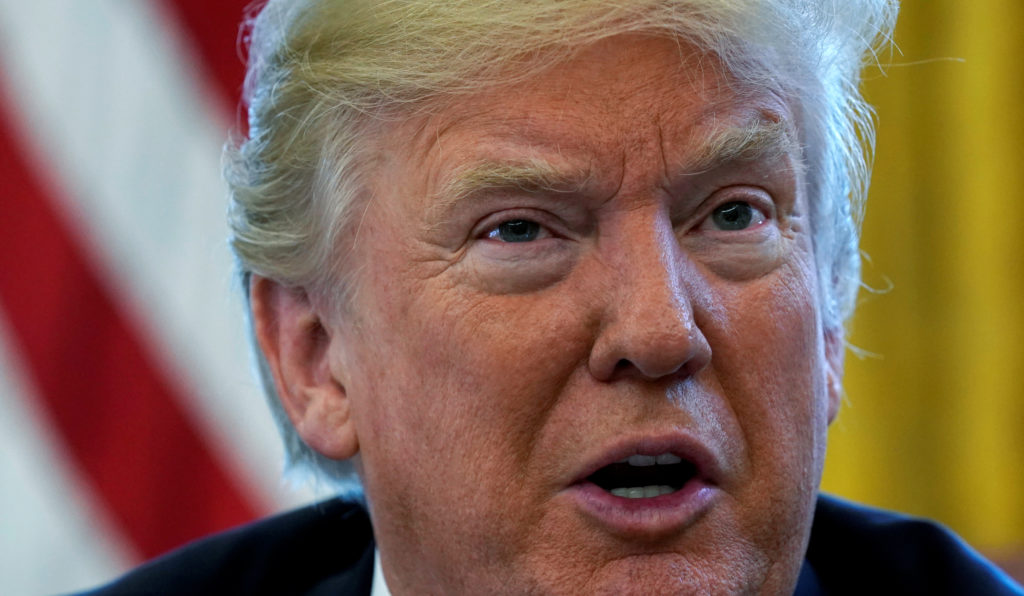U.S. President Donald Trump speaks during an interview with Reuters at the White House in Washington, U.S., January 17, 20...