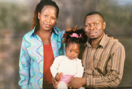 Photograph of Sarah Omega, her husband Kennedy Otieno and their daughter, Jade