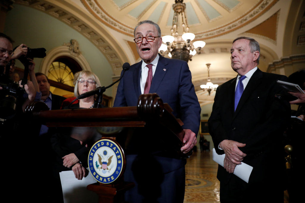 Senate Minority Leader Chuck Schumer, accompanied by Sen. Dick Durbin (D-IL) and Sen. Patty Murray (D-WA), speaks with rep...