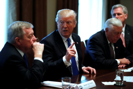 U.S. President Donald Trump, flanked by U.S. Senator Dick Durbin (D-IL), Representative Steny Hoyer (D-MD) and House Majority Leader Kevin McCarthy (R-CA), holds a bipartisan meeting with legislators on immigration reform at the White House in Washington, U.S. January 9, 2018. REUTERS/Jonathan Ernst - RC1ADD70FE50
