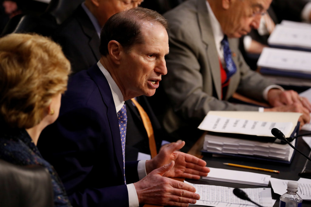 Sen. Ron Wyden (D-OR) speaks during a markup on the "Tax Cuts and Jobs Act" on Capitol Hill in Washington, U.S., November ...