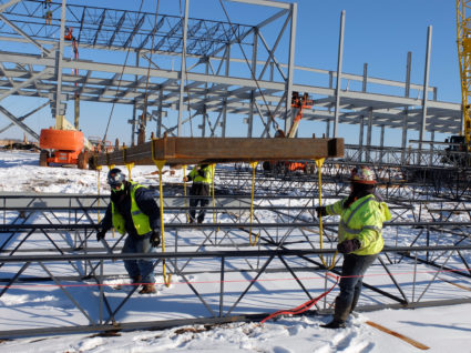 Workers are seen during the construction of the LG Electronics washing machine plant in Clarksville, Tennessee, U.S. January 18, 2018. Picture taken January 18, 2018. REUTERS/David Lawder - RC1675805500