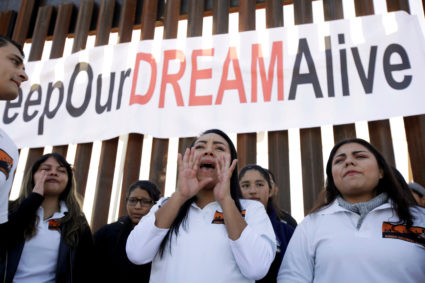 'Dreamers' react as they meet with relatives during the 'Keep Our Dream Alive' binational meeting at a new section of the border wall on the U.S.-Mexico border in Sunland Park in December. Photo by Jose Luis Gonzalez/Reuters