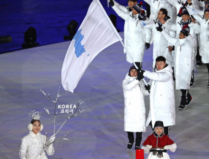 Athletes from North and South Korea walk together under a unified flag in the Olympics opening ceremony on Feb. 9. Photo by Damir Sagolj/Reuters