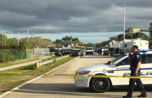 Police patrol the area outside Marjory Stoneman Douglas High School following a school shooting incident in Parkland, Florida, U.S., February 15, 2018. REUTERS/Zachary Fagenson - RC13BDCCCF10