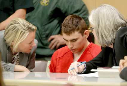Nikolas Cruz, facing 17 charges of premeditated murder in the mass shooting at Marjory Stoneman Douglas High School in Parkland, Florida, appears in court for a status hearing in Fort Lauderdale, Florida. Photo by Mike Stocker/Reuters