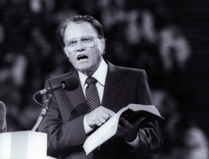 Evangelist Billy Graham, preaches the Gospel to thousands of believers during the meeting at Bercy's Stadium in Paris as part of a worldwide crusade, September 20, 1986.