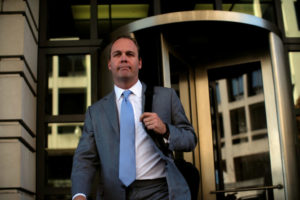 FILE PHOTO: Former U.S. President Donald Trump campaign aide Rick Gates departs after a status conference at the U.S. District Court following his indictment on tax fraud and money laundering charges in the special counsel's investigation into alleged Russian meddling in the 2016 U.S. presidential election. REUTERS/James Lawler Duggan/File Photo