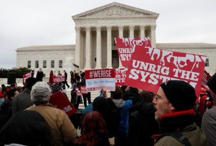 Union supporters rally outside of the United States Supreme Court in Washington on Feb. 26, 2018. Photo by REUTERS/Leah Millis