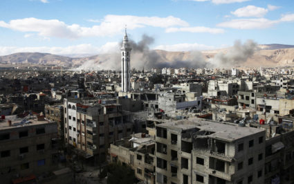 Smoke rises from the besieged Eastern Ghouta in Damascus, Syria, on Feb. 27. Photo by Bassam Khabieh/Reuters