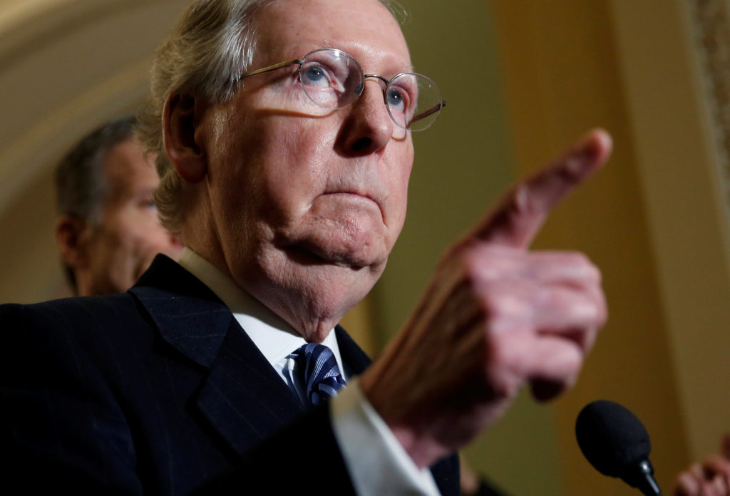 Senate Majority Leader Mitch McConnell (R-KY) speaks to reporters on Capitol Hill in Washington, U.S., January 30, 2018. R...