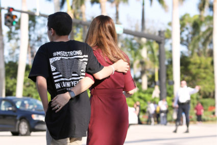 Students arrive at Marjory Stoneman Douglas High School for the first time since the mass shooting in Parkland, Florida, U.S., February 28, 2018. Photo by Mary Beth Koeth/REUTERS