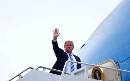 U.S. President Donald Trump boards Air Force One as he departs for West Palm Beach, Florida, from Joint Base Andrews, Maryland, U.S., February 16, 2018. REUTERS/Eric Thayer - RC1964FE72E0