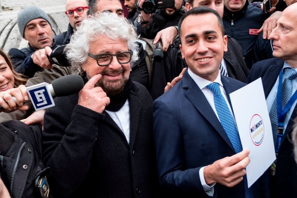 Five Star Movement leader Luigi Di Maio (right) poses with the party's founder, Beppe Grillo, in January 2018. Andreas Sol...