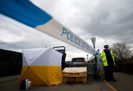 A police officer stands at a cordon placed around a payment machine covered by a tent in a supermarket car park near to where former Russian intelligence agent Sergei Skripal and his daughter Yulia were found poisoned in Salisbury, Britain. Photo by Henry Nicholls/Reuters