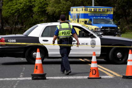 Members of Austin Police Department block off part of Republic of Texas Boulevard following an explosion in Austin, Texas, U.S., March 19, 2018. REUTERS/Sergio Flores - RC1FE7161820