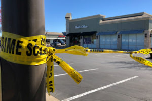 A police crime scene tape blocks off a FedEx store which is closed, with police saying it may be linked to the overnight bomb at Schertz, Texas FedEx facility, in Austin, Texas, U.S., March 20, 2018. REUTERS/Jon Herskovitz