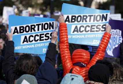 Protesters demonstrate in front of the U.S. Supreme Court in Washington