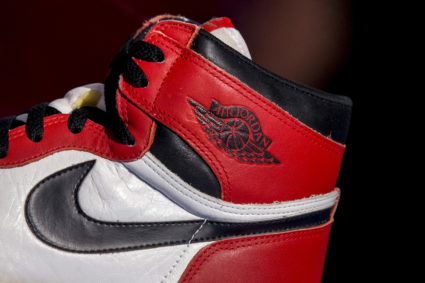 The famous Nike swoosh and Air Jordan logo is seen on an Air Jordan 1, called "Notorious" released from 1984-1985, during a preview for "The Rise of the Sneaker Culture" exhibit at the Brooklyn Museum in the Brooklyn borough of New York, July 8, 2015. REUTERS/Brendan McDermid - GF10000153181