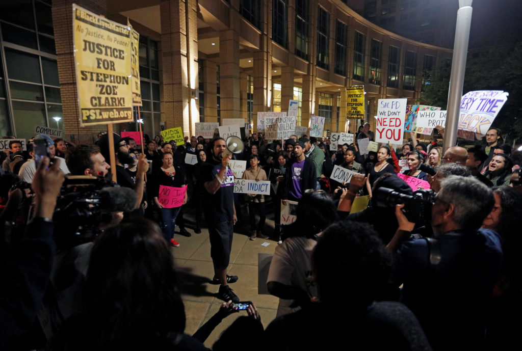 Demonstrators gather outside City Hall to protest the police shooting of Stephon Clark, in Sacramento, California, U.S., M...