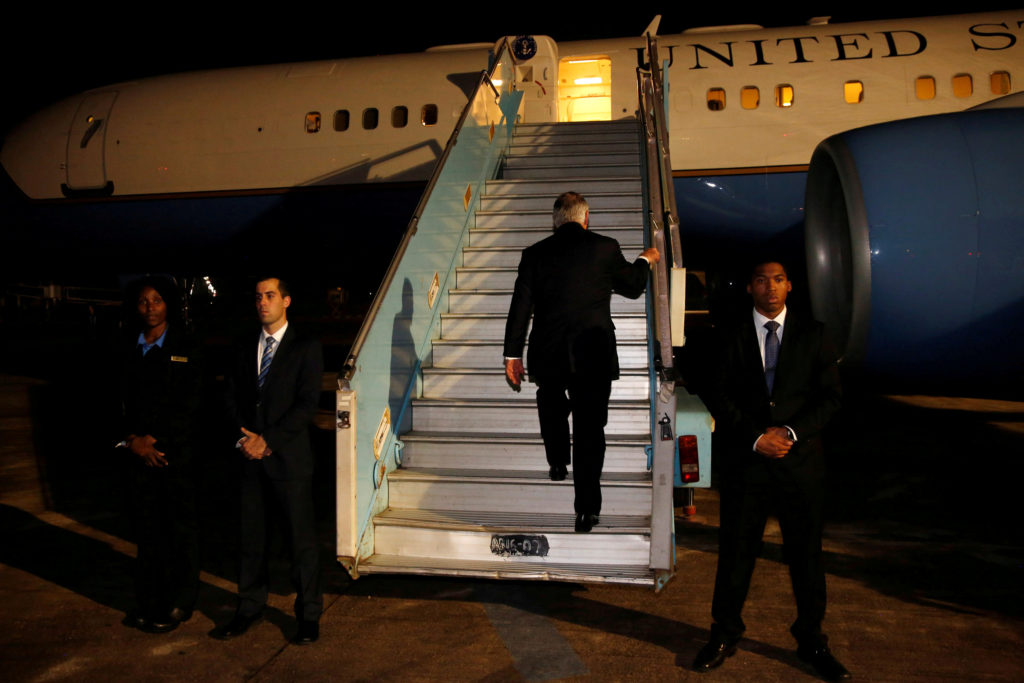 U.S. Secretary of State Rex Tillerson boards his plane to depart at the end of a five-country swing through Africa from Ab...