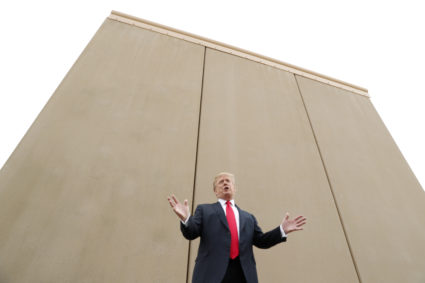 U.S. President Donald Trump speaks while participating in a tour of U.S.-Mexico border wall prototypes near the Otay Mesa Port of Entry in San Diego, California. U.S., March 13, 2018. REUTERS/Kevin Lamarque - HP1EE3D1J8Y5A