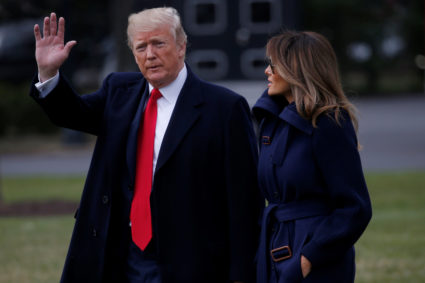 U.S. President Donald Trump waves to the news media while walking with first lady Melania Trump to board Marine One to depart for travel to New Hampshire from the South Lawn of the White House in Washington, U.S., March 19, 2018. REUTERS/Leah Millis - RC1A7071EBB0