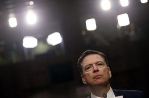 Former FBI Director James Comey pauses as he testifies before a Senate Intelligence Committee hearing on Russia's alleged interference in the 2016 U.S. presidential election on Capitol Hill in Washington, D.C. Photo by Jonathan Ernst/Reuters
