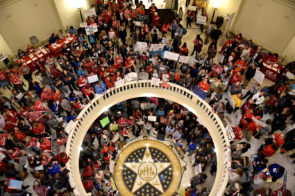 Teachers pack the state Capitol rotunda to capacity, on the second day of a teacher walkout, to demand higher pay and more funding for education, in Oklahoma City, Oklahoma, U.S., April 3, 2018.