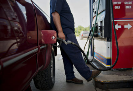 Lower oil prices could mean Americans save more at the gas pump, but it could also hurt regions of the country that rely heavily on oil production. File photo by Daniel Acker/Bloomberg via Getty Images