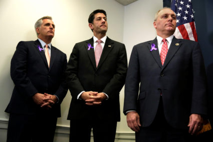 U.S. House Speaker Paul Ryan (R-WI) (C) stands between House Majority Leader Rep. Kevin McCarthy (R-CA) (L) and Majority Whip Rep. Steve Scalise (R-LA) during a news conference following their closed party conference on Capitol Hill in Washington, U.S. May 11, 2016. REUTERS/Yuri Gripas - D1AETDLIWNAA