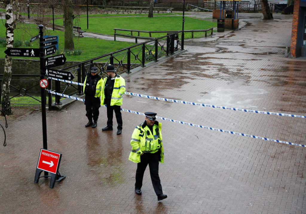 Police officers stand on March 28 near the site where former Russian intelligence officer Sergei Skripal and his daughter ...