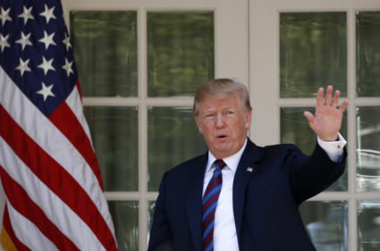 U.S. President Donald Trump departs after giving remarks on tax cuts for American workers during an event in the White House Rose Garden in Washington, U.S., April 12, 2018. REUTERS/Kevin Lamarque - HP1EE4C1FBMC4