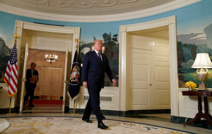 U.S. President Donald Trump arrives to announce military strikes on Syria as new National Security Advisor John Bolton follows behind at the White House in Washington, U.S., April 13, 2018. Photo By Yuri Gripas/Reuters