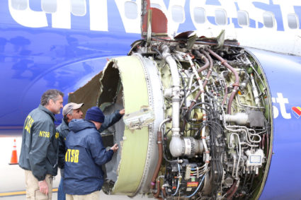 NTSB investigators are on scene examining damage to the engine of the Southwest Airlines plane in this image released from Philadelphia, Pennsylvania. Photo by NTSB via Reuters