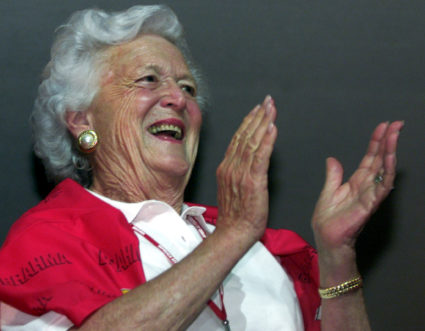 FILE PHOTO: Barbara Bush, the mother of U.S. President George W. Bush, watches the Carnival parade from a VIP room at the Sambadrome stadium, in Rio de Janeiro, Brazil, February 10, 2002. REUTERS/Jamil Bittar/File Photo.